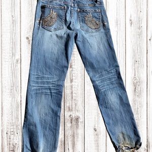 Cowgirl Tuff Co. 33x32 blue jeans worn. They have stains on bottom as pictured